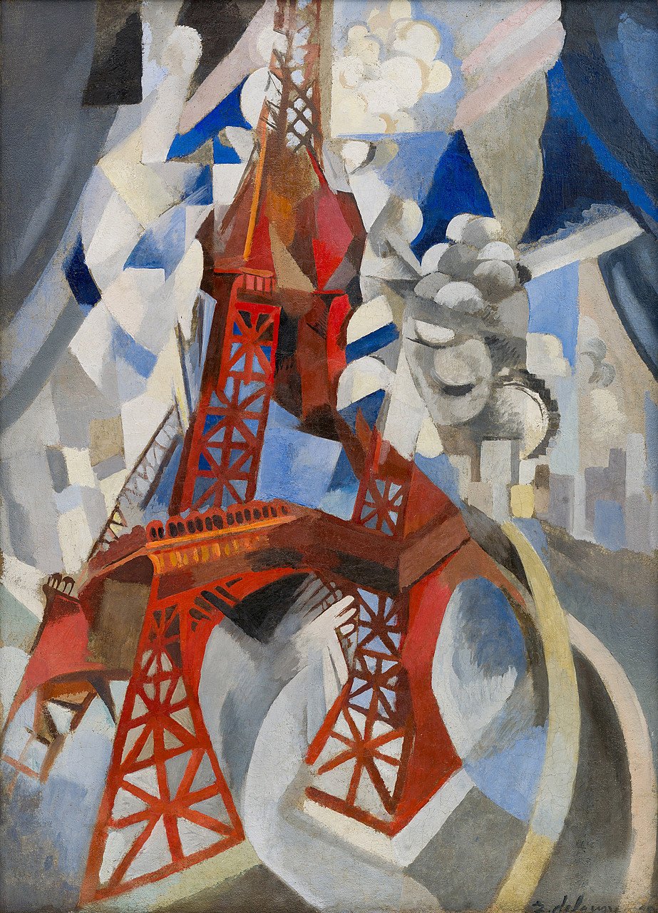 ロベール・ドローネー「Red Eiffel Tower」：灰色、ベージュ、青の都市、雲、煙の断片のなかに立つ、交差する鉄の梁でできた朱色のエッフェル塔